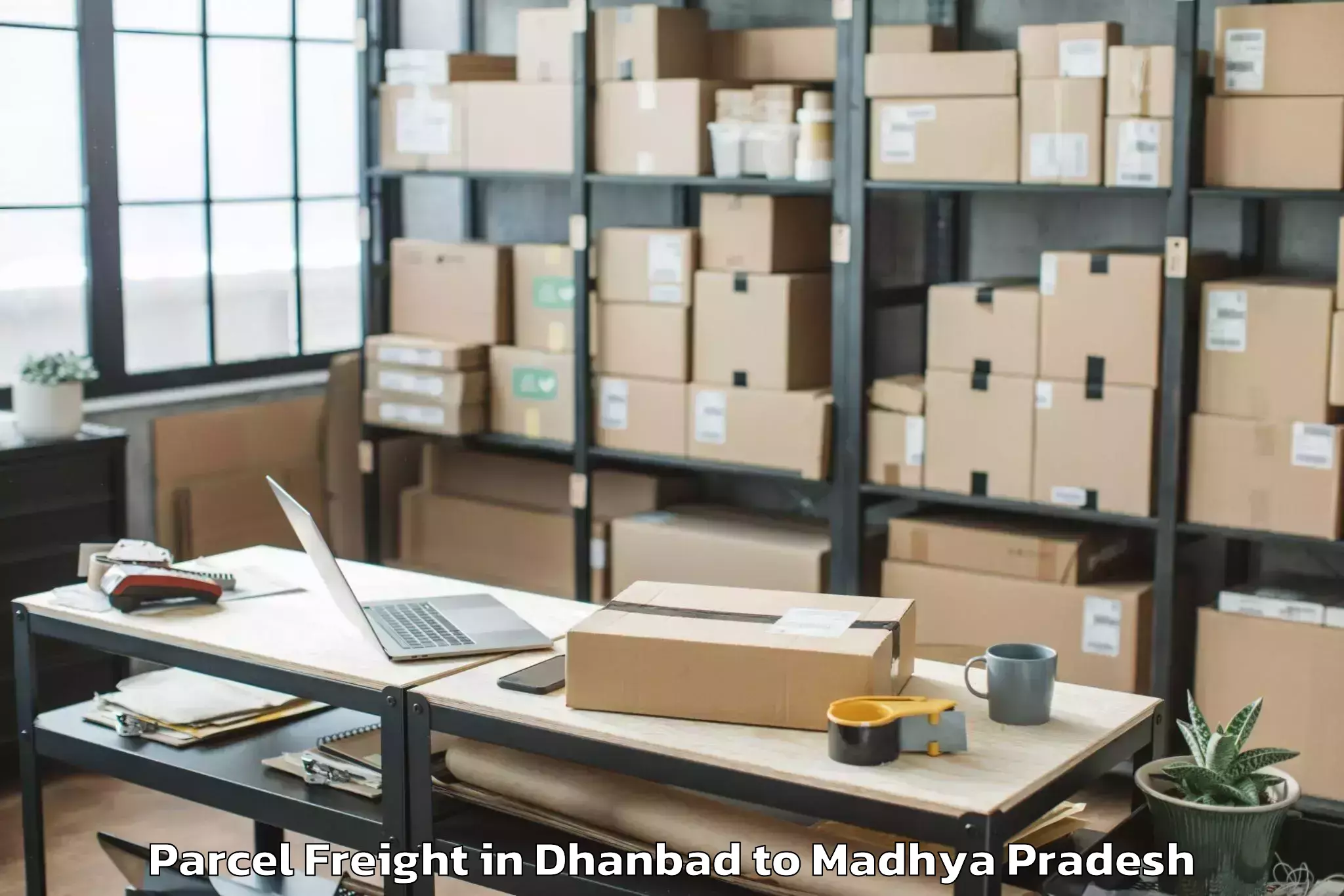 Book Your Dhanbad to Mauganj Parcel Freight Today